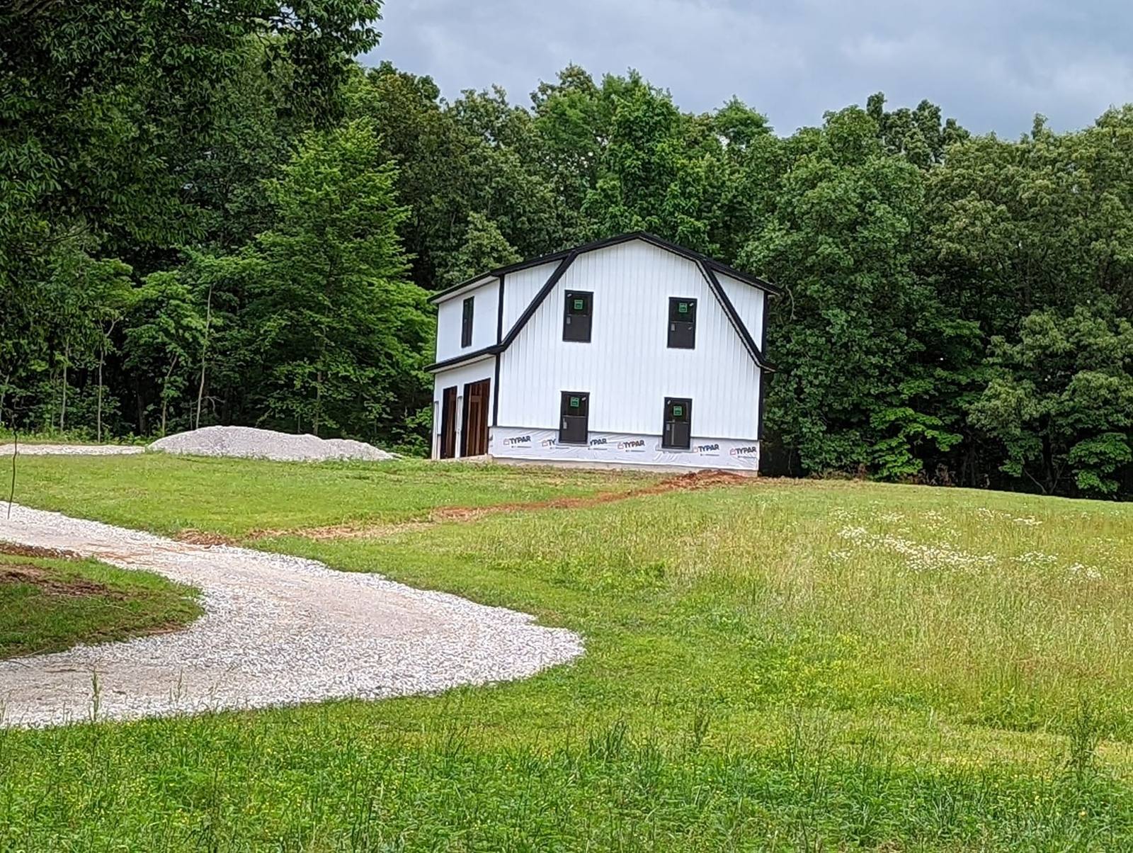 White metal barndominium built by TruBuild